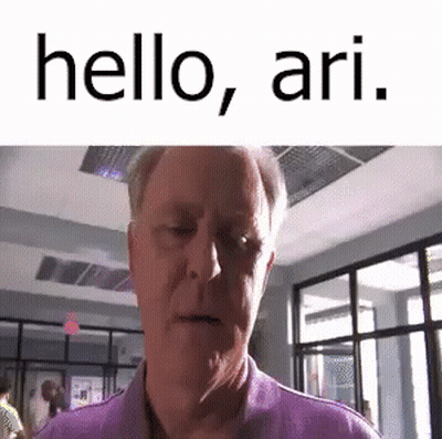 Man In Purple Shirt Saying Hello Ari GIF