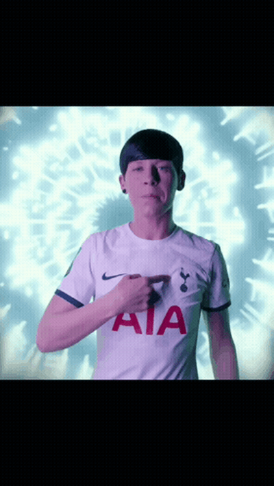 Man In Purple Shirt Sitting On Couch GIF