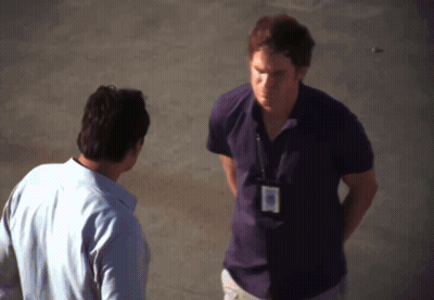 Man In Purple Shirt With Name Tag GIF