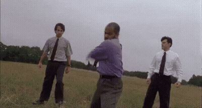 Man In Purple Shirt With Two Others In Field GIF
