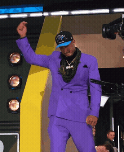 Man In Purple Suit And Panthers Hat Dancing GIF