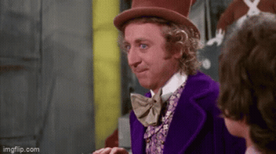 Man In Purple Suit And Top Hat Smiling Talking To Another Man GIF