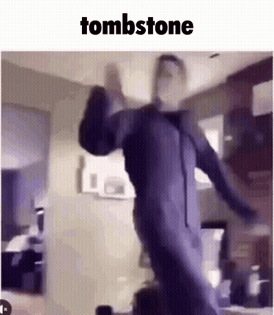 Man In Purple Suit Dancing Under Tombstone GIF