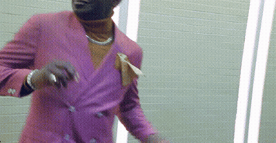 Man In Purple Suit Dancing GIF