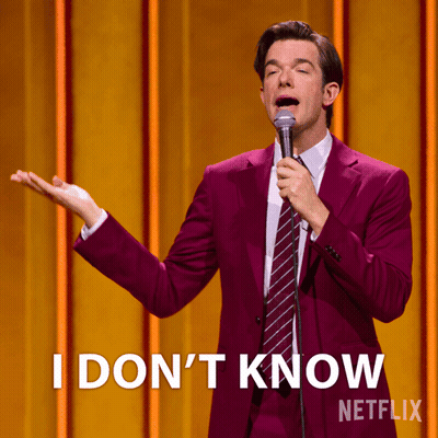 Man In Purple Suit Holding Microphone Saying I Don't Know GIF