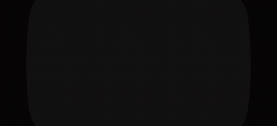 Man In Purple Suit In Front Of Disco Ball GIF