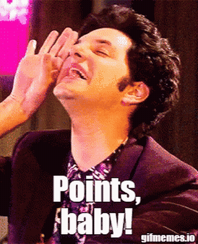 Man In Purple Suit Laughing Points Baby GIF