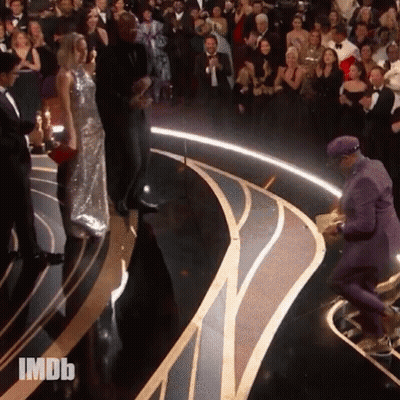 Man In Purple Suit On Stage With IMDB Crowd GIF