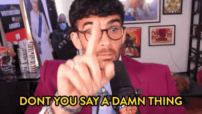 Man In Purple Suit Pointing Don't You Say A Damn Thing GIF