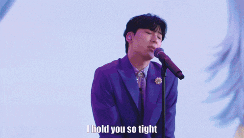 Man In Purple Suit Singing I Hold You So Tight GIF