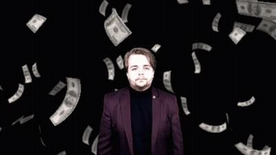 Man In Purple Suit Surrounded By Hundred Dollar Bills GIF