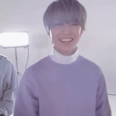 Man In Purple Sweater And White Turtleneck Smiling GIF