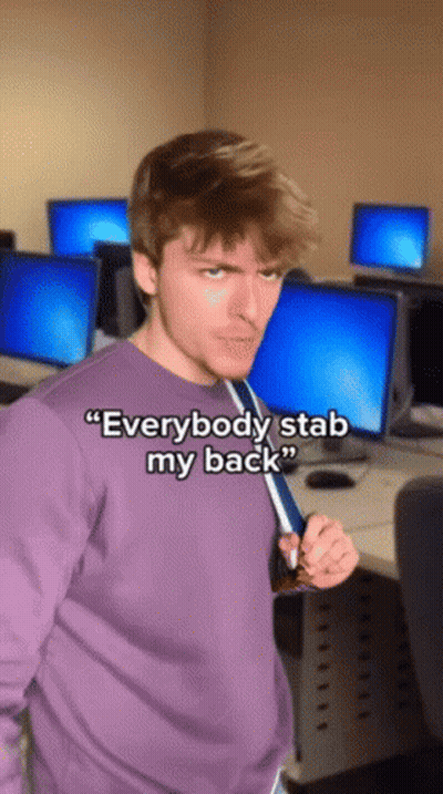 Man In Purple Sweater Says Everybody Stab My Back GIF