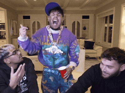 Man In Purple Sweater With California GIF
