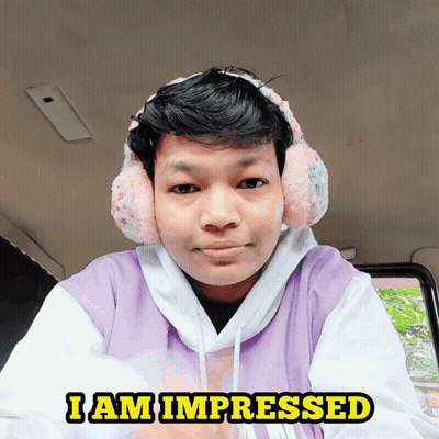 Man In Purple Sweatshirt And Ear Muffs Saying I Am Impressed GIF