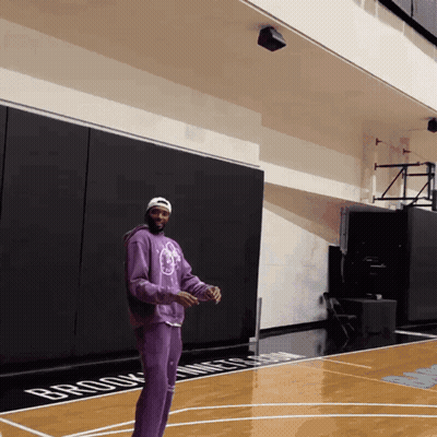 Man In Purple Sweatshirt On Brooklyn Nets Court GIF