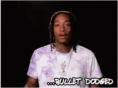 Man In Purple Tie Dye Shirt Says Bullet Dogged GIF