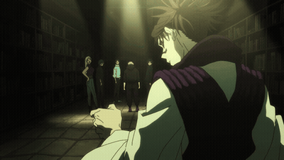 Man In Purple Vest In Dark Room With Others GIF