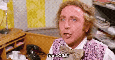 Man In Purple Vest Saying You Lose At Desk GIF