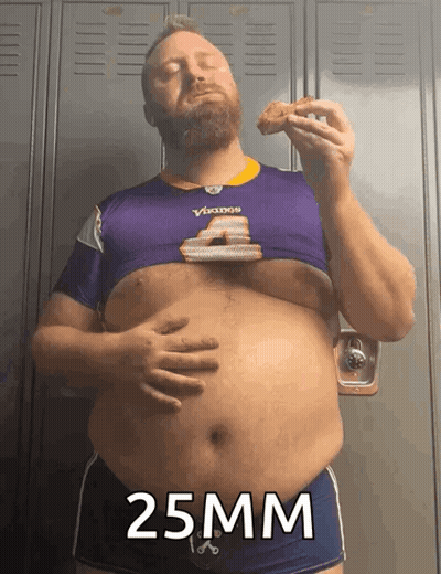 Man In Purple Vikings Shirt Eating Chicken GIF