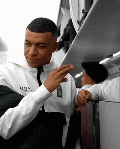 Man In Qata Airways Jacket GIF