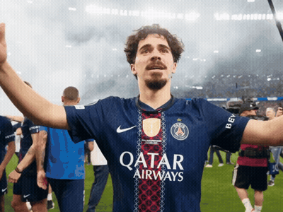 Man In Qatar Airways Jersey Standing On Field GIF