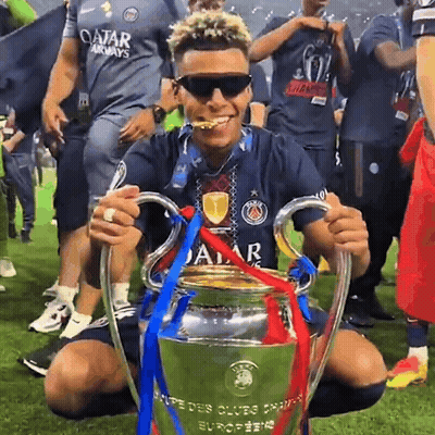 Man In Qatar Airways Shirt Holding Trophy GIF
