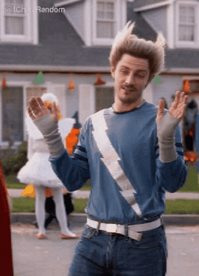 Man In Quicksilver Costume With Arms Outstretched GIF