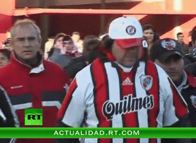Man In Quilmes Jersey And Hat GIF