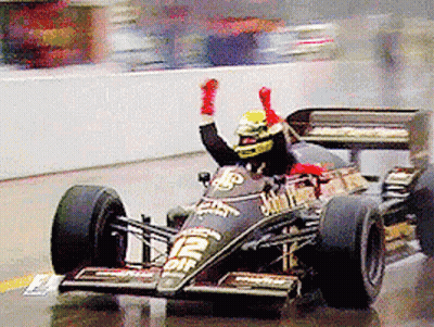 Man In Race Car With Elf GIF
