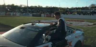 Man In Race Car With Hamlin On Windshield GIF