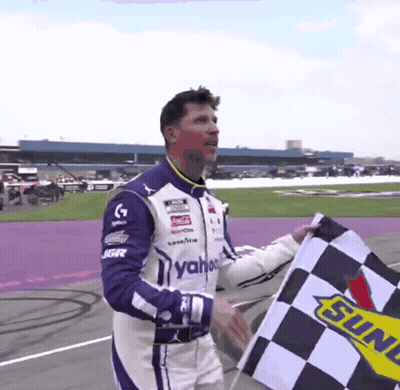 Man In Racing Suit Holding Checkered Flag Sunoco GIF