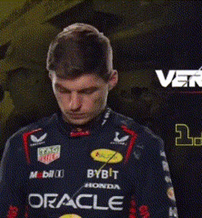 Man In Racing Uniform With Oracle GIF