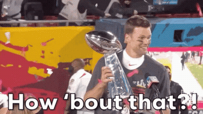 Man In Raiders Hat And Gloves Standing On Field GIF