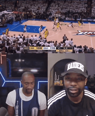 Man in Raiders Hat Watching Basketball