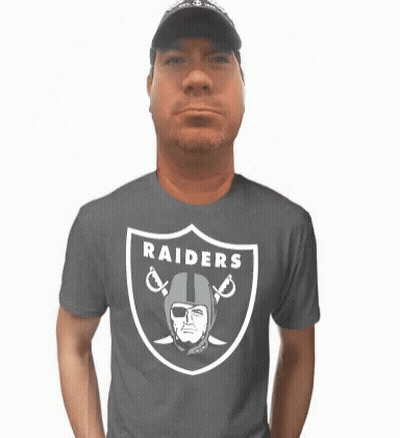 Man In Raiders T-Shirt With Helmet And Sword GIF