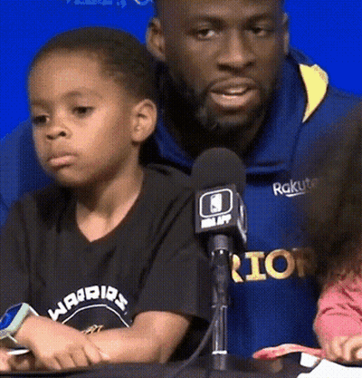 Man In Rakuten Sweatshirt Sitting Next To Boy GIF