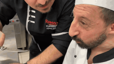 Man In Ramad Shirt Teaching How To Cook GIF