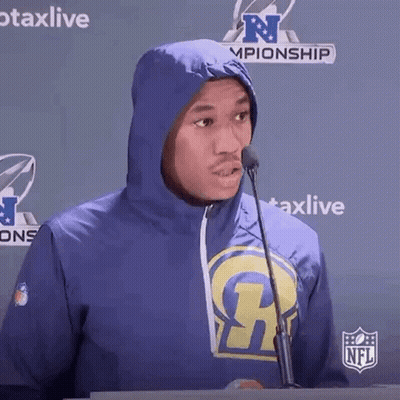 Man In Rams Hoodie At Microphone GIF