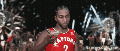 Man In Raptors Jersey Holding Drink GIF