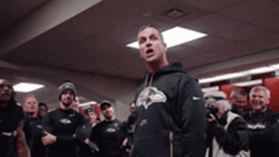 Man In Ravens Sweatshirt In Front Of Crowd GIF