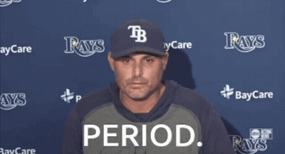 Man In Rays Hat Drinking From Green Cup GIF