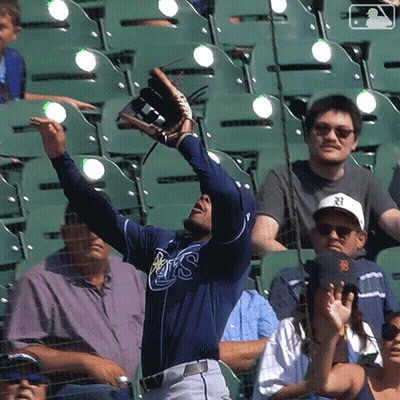 Man In Rays Jersey Catching Baseball GIF