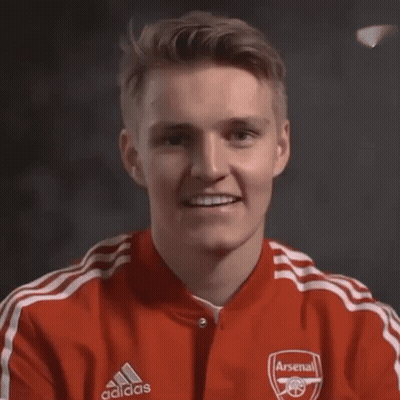 Man In Red Adidas Jacket With Arsenal Logo GIF