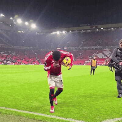 Man In Red Adidas Jersey Holding Soccer Ball GIF