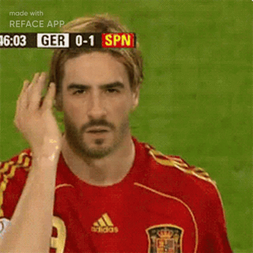 Man In Red Adidas Jersey Stands On Field GIF