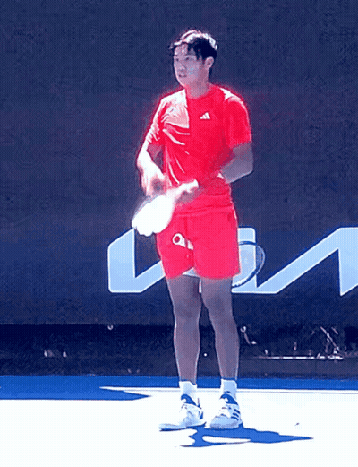 Man In Red Adidas Shirt Holding Tennis Racquet GIF