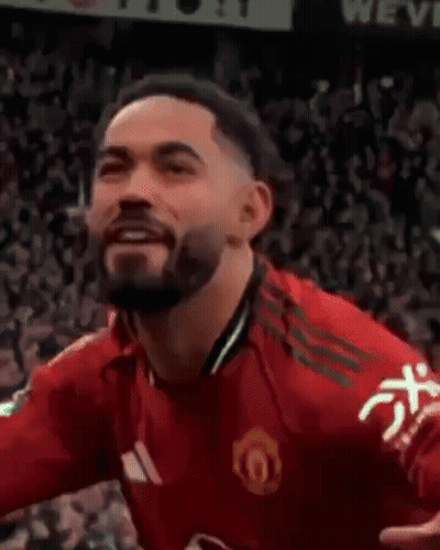 Man In Red Adidas Shirt Laughing And Tongue Out GIF