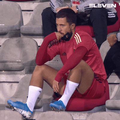 Man In Red Adidas Shirt Sitting GIF