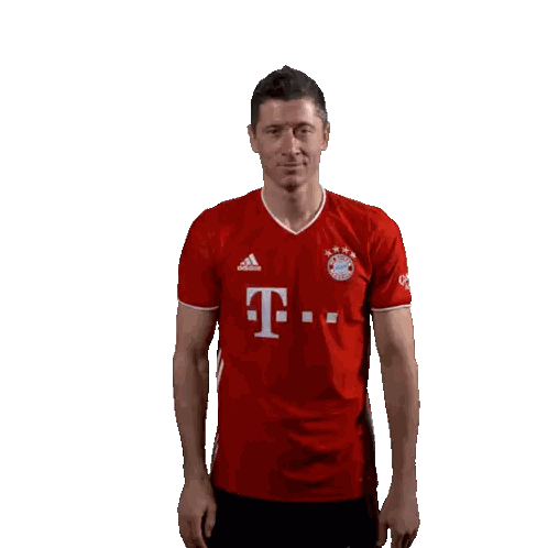 Man In Red Adidas Shirt With T Sticker